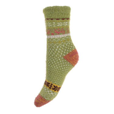 Green knitted sock with Fairisle pattern on a white background