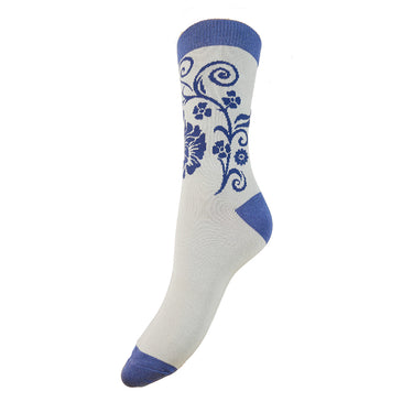 Pale blue sock with blue floral pattern on a white background