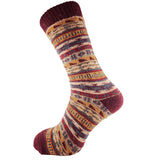 Red Nordic patterned sock on a white background