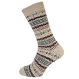 Knitted sock with a fairisle pattern on a white background