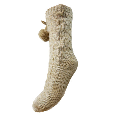 Beige knitted sock with a pom-pom on a white background