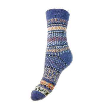 Blue knitted sock with a Fairisle pattern on a white background