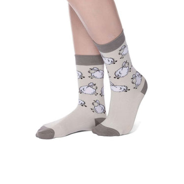 Beige bamboo socks with brown heel toe and cuff with white sheep motif, size 4-7